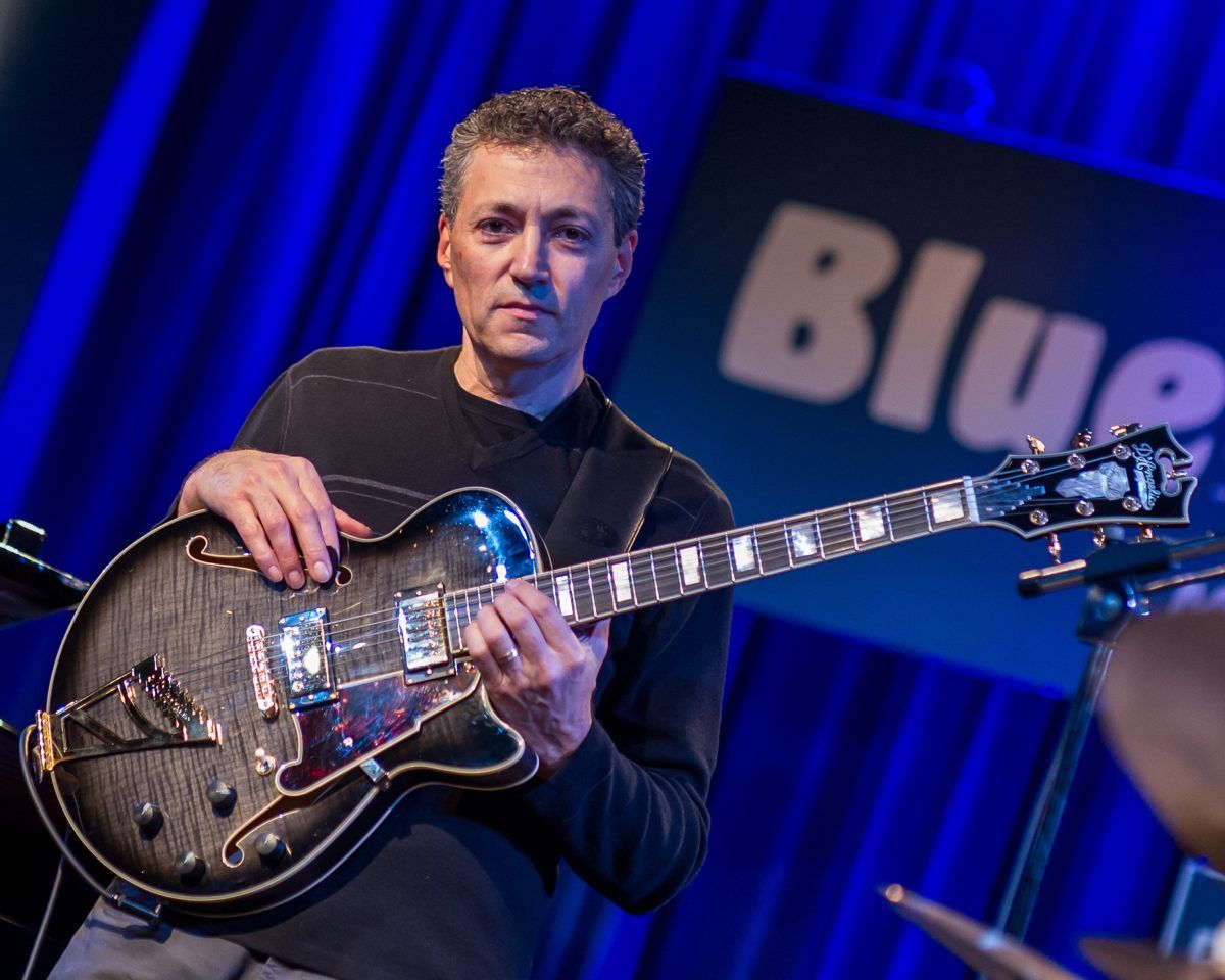 Vinny Valentino on stage with his archtop guitar